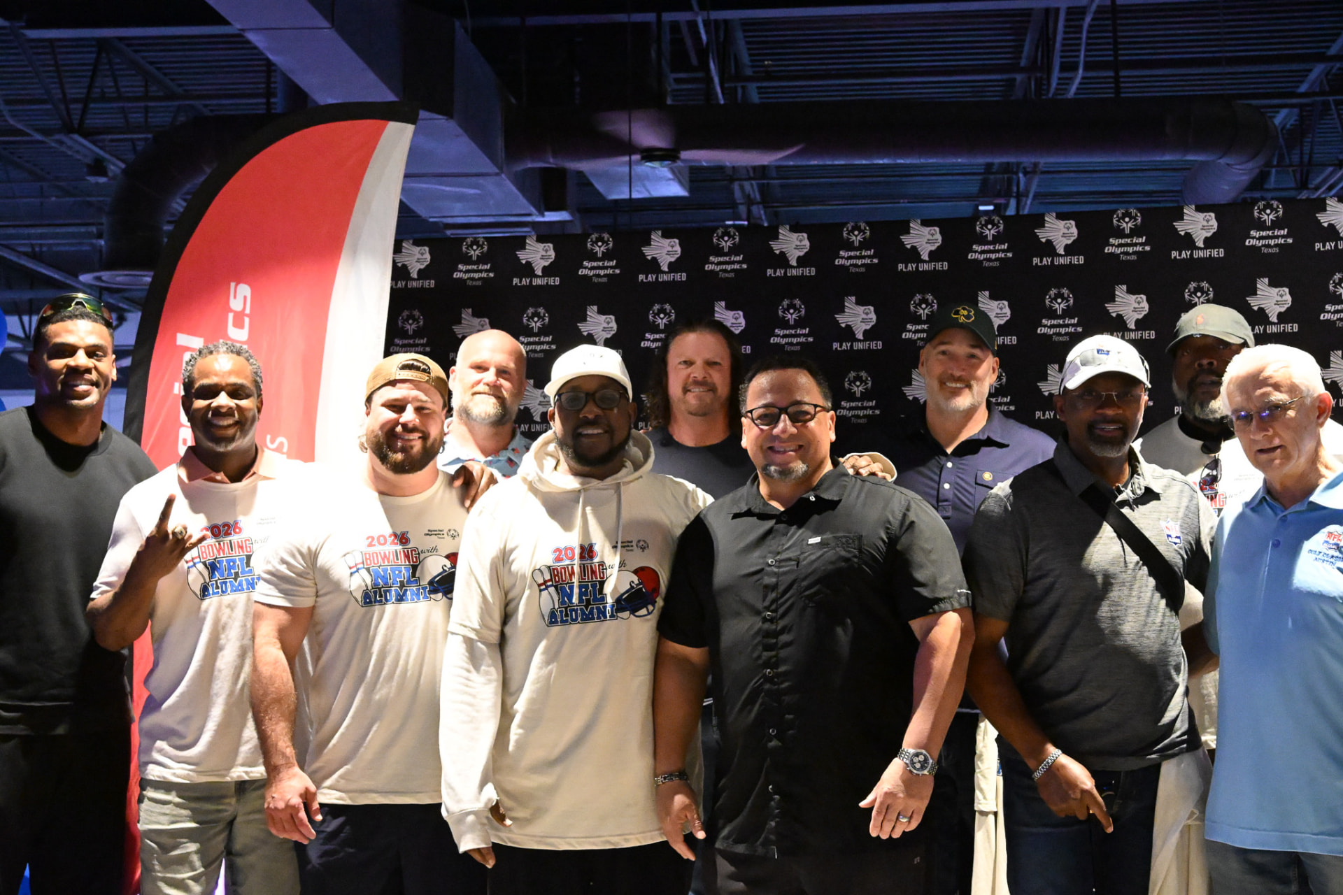 Group photo from the foundation's Bowling with NFL Alumni fundraiser